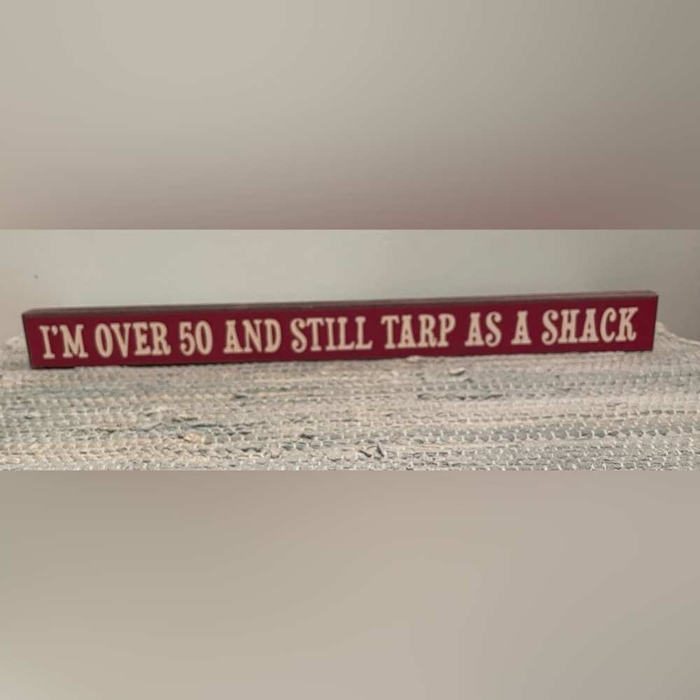 Funny wood shelf sitter: I’m over 50 and still tarp as a shack. NWT